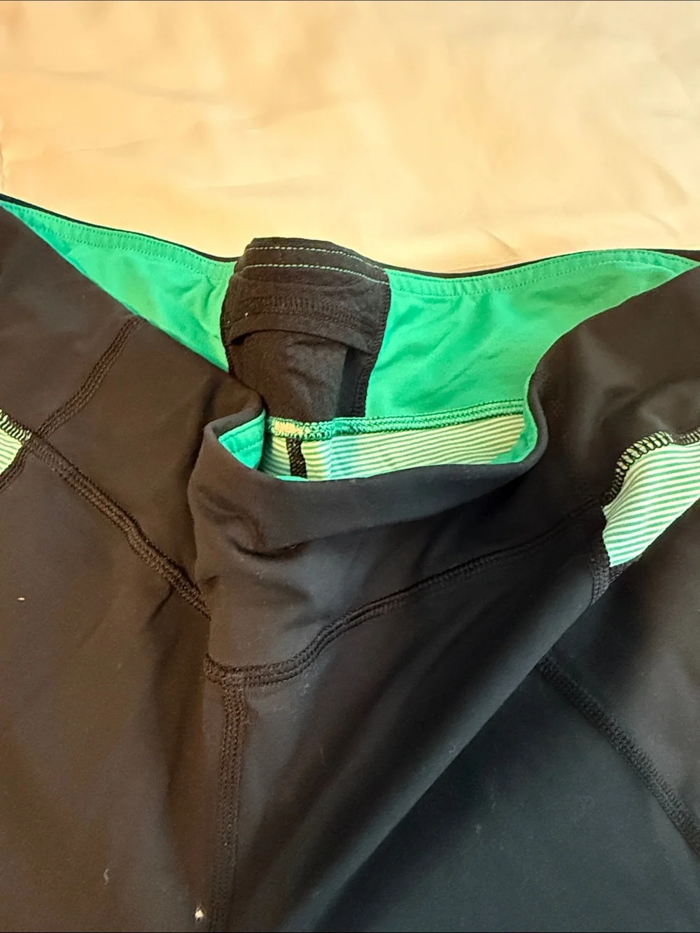 lululemon athletica Black Leggings with Green Accent Panels 10 fair shape